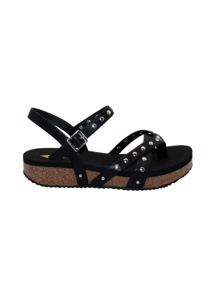 Volatile's Kelton sandal in a vegan leather is our warm weather staple. The low platform wedge adds a subtle lift while offering stability, perfect for dressing up weekend wear or keeping fashionably comfortable at the next outdoor party. Style them with everything, from shorts to dresses, and more. black 
