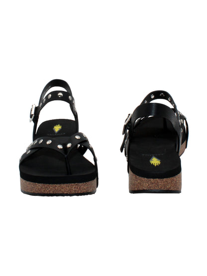  Volatile's Kelton sandal in a vegan leather is our warm weather staple. The low platform wedge adds a subtle lift while offering stability, perfect for dressing up weekend wear or keeping fashionably comfortable at the next outdoor party. Style them with everything, from shorts to dresses, and more. black  3
