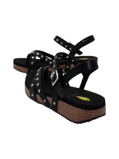   Volatile's Kelton sandal in a vegan leather is our warm weather staple. The low platform wedge adds a subtle lift while offering stability, perfect for dressing up weekend wear or keeping fashionably comfortable at the next outdoor party. Style them with everything, from shorts to dresses, and more. black 4