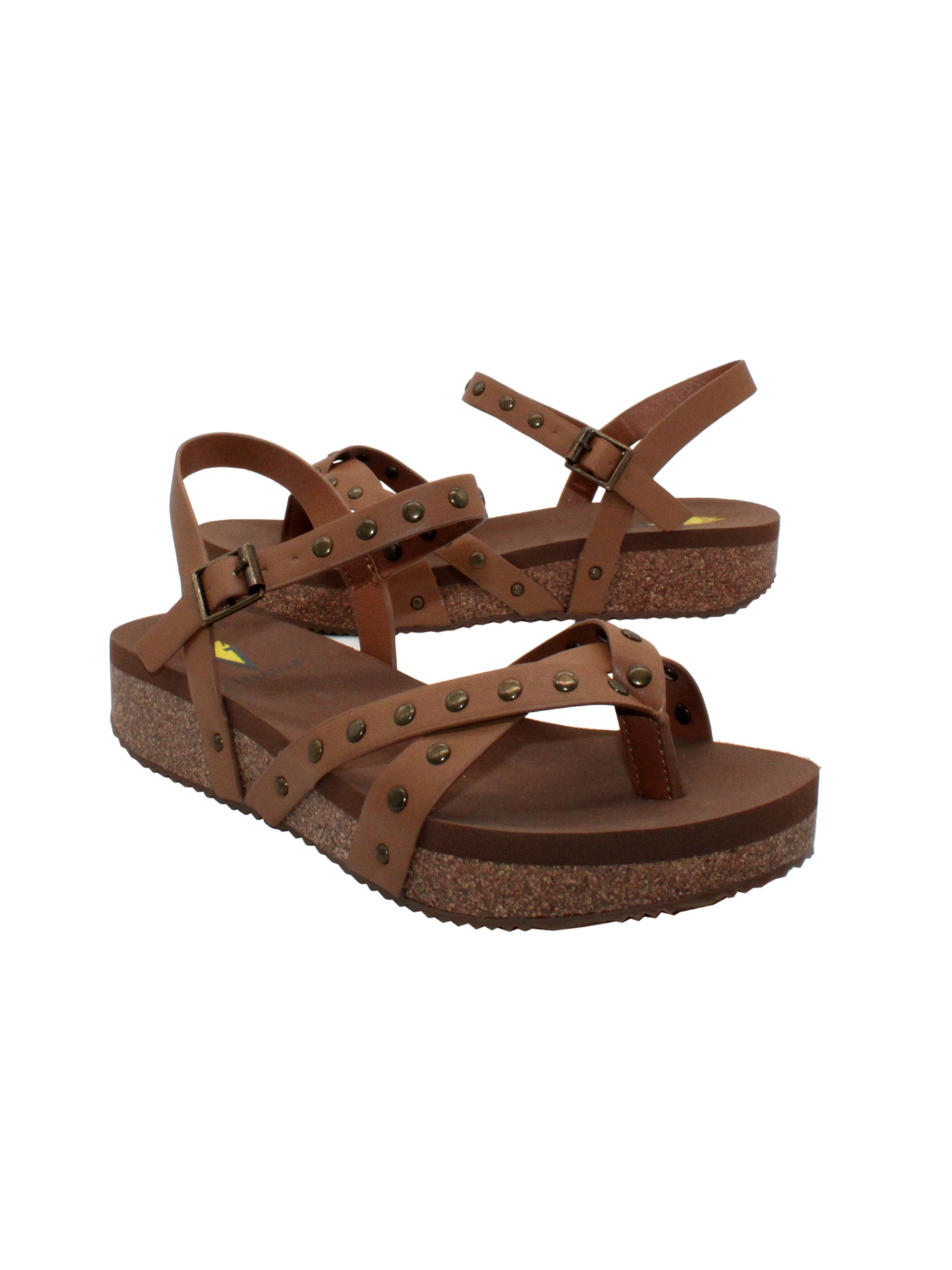  Volatile's Kelton sandal in a vegan leather is our warm weather staple. The low platform wedge adds a subtle lift while offering stability, perfect for dressing up weekend wear or keeping fashionably comfortable at the next outdoor party. Style them with everything, from shorts to dresses, and more. tan  2