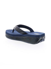 The Mini Croco thong wedge sandal by Volatile is crafted from a luxe, glossy faux crocodile material and gives a modest lift in height with the comfortable 1 1/2” wedge. They feature Volatile’s signature ultra comfort EVA insole for all day comfort, padded textile lining that rests gently on the skin, and nonskid rubber traction outsoles to keep feet grounded on all surfaces.  navy 4