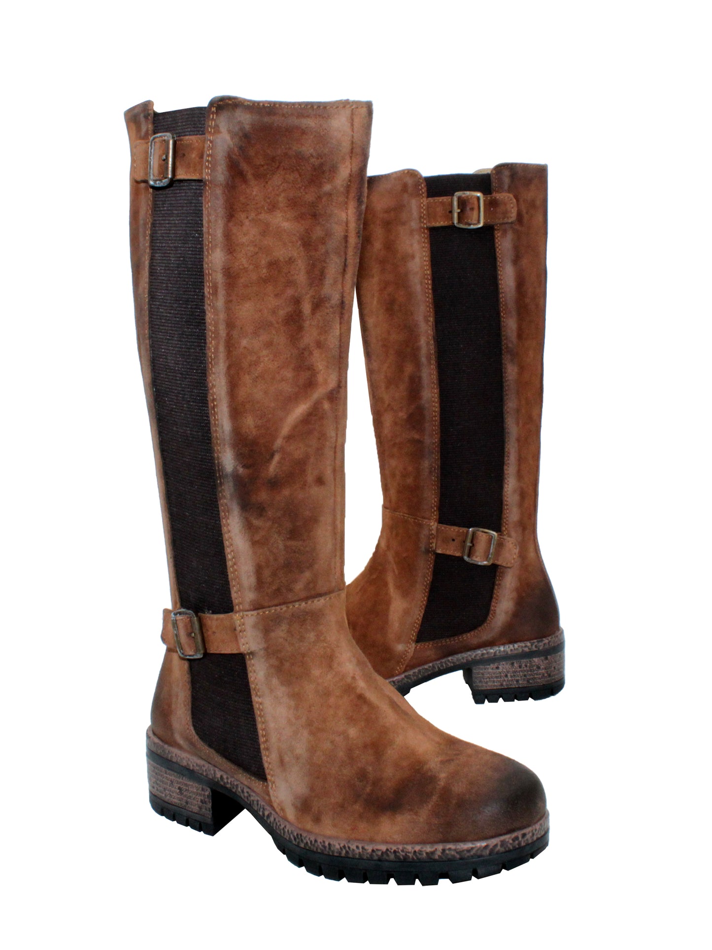 Very Volatile’s ‘Mitchell’ lug bottom boots are tough yet chic, bold yet ultra-versatile, and set on comfortable, chunky lug soles. Featuring adjustable double buckle accents with elastic goring, partial inside zipper, so all you need to use is the zipper to slip these on and go. Pair these with everything from cropped trousers to satin slip dresses. cognac 2 