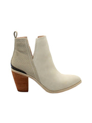 Very Volatile’s ‘Mumba’ open shank, pull-on bootie can complete any look in your fall wardrobe with its genuine hair calf or faux exotic upper. Set on a stacked leather heel, this pair nods to the Western trend with a burnished metal heel rand and tapered toe shape. Wear them with everything from skinny jeans to feminine dresses.