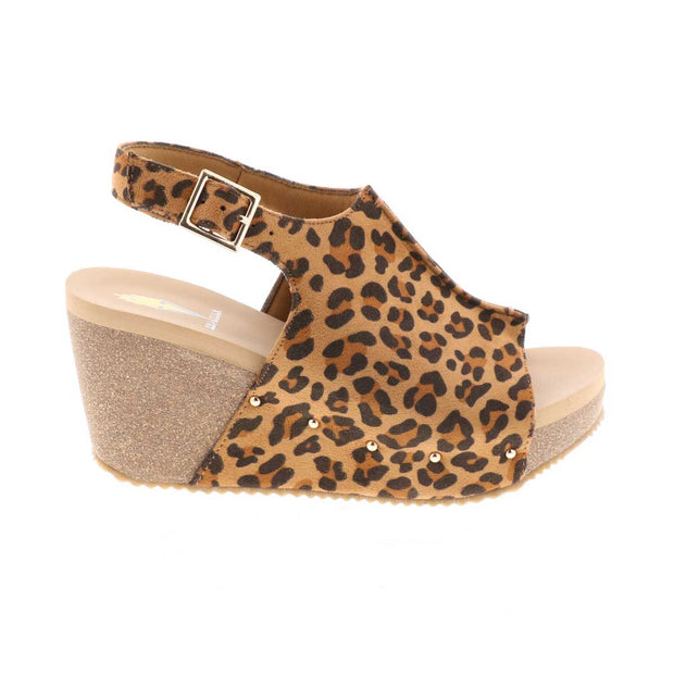 One of Volatile’s classic signature styles, the leopard Division wedge sandal brings ultra-comfort to casual fashion like no other. The adjustable ankle strap offers stability, the padded lining and signature ultra-comfort EVA insole keeps feet feeling rested even after a full day of adventure, and the rubber traction outsole means these are safe for walking on any surface. Pack these for your next trip to wear with shorts for sightseeing and a flowy dress for special events.