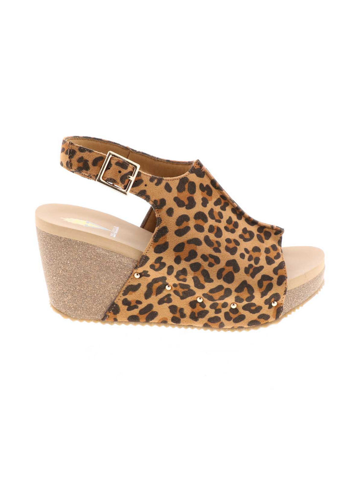 One of Volatile’s classic signature styles, the leopard Division wedge sandal brings ultra-comfort to casual fashion like no other. The adjustable ankle strap offers stability, the padded lining and signature ultra-comfort EVA insole keeps feet feeling rested even after a full day of adventure, and the rubber traction outsole means these are safe for walking on any surface. Pack these for your next trip to wear with shorts for sightseeing and a flowy dress for special events.