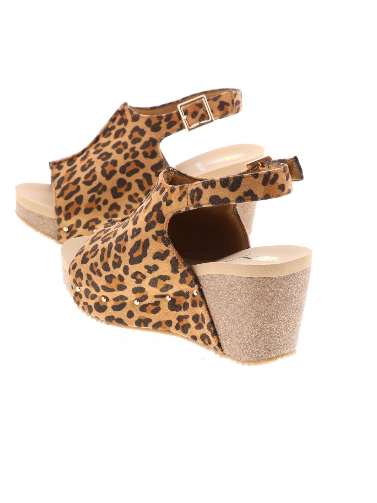 One of Volatile’s classic signature styles, the leopard Division wedge sandal brings ultra-comfort to casual fashion like no other. The adjustable ankle strap offers stability, the padded lining and signature ultra-comfort EVA insole keeps feet feeling rested even after a full day of adventure, and the rubber traction outsole means these are safe for walking on any surface. Pack these for your next trip to wear with shorts for sightseeing and a flowy dress for special events.4